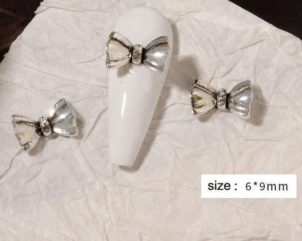 10pcs Retro Punk Nail Art Charm 3D Punk Silver Bows Heart Rabbit Dollar