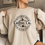 Die Magie des Schwelgens in Witches Brew Sweater Kaffeepullovern