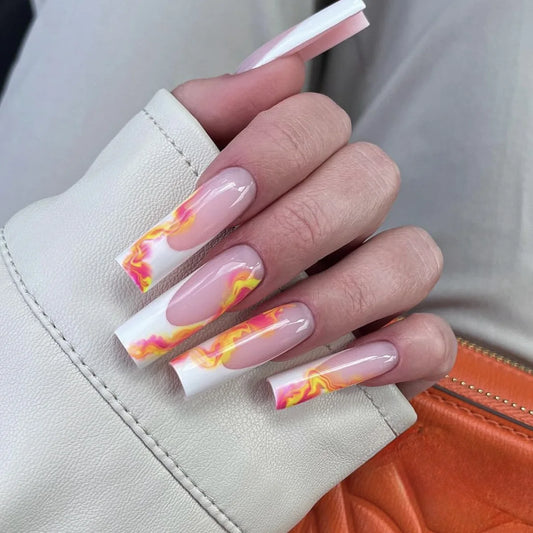 Orange Ombre Nails with Flames Perfect for a Festival Look