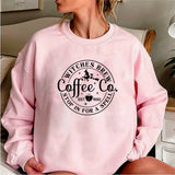 Die Magie des Schwelgens in Witches Brew Sweater Kaffeepullovern