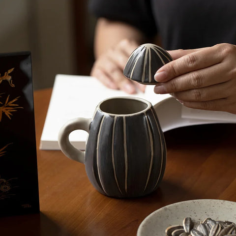 Melon Seed Mug with Hand-Carved Design and Ceramic Lid