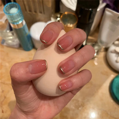 Nude Nails with Gold Tips