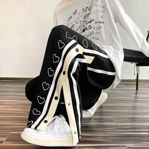 Bleiben Sie trendige koreanische Version zweireihiger Schlitzhosen im lockeren Y2K-Stil