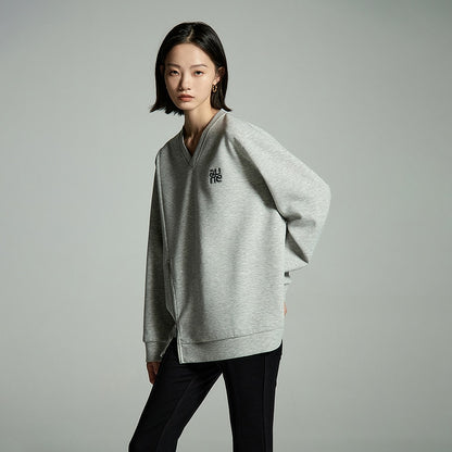 Chic and Comfy: Unique Zippered Split Hem Sweatshirt for Women